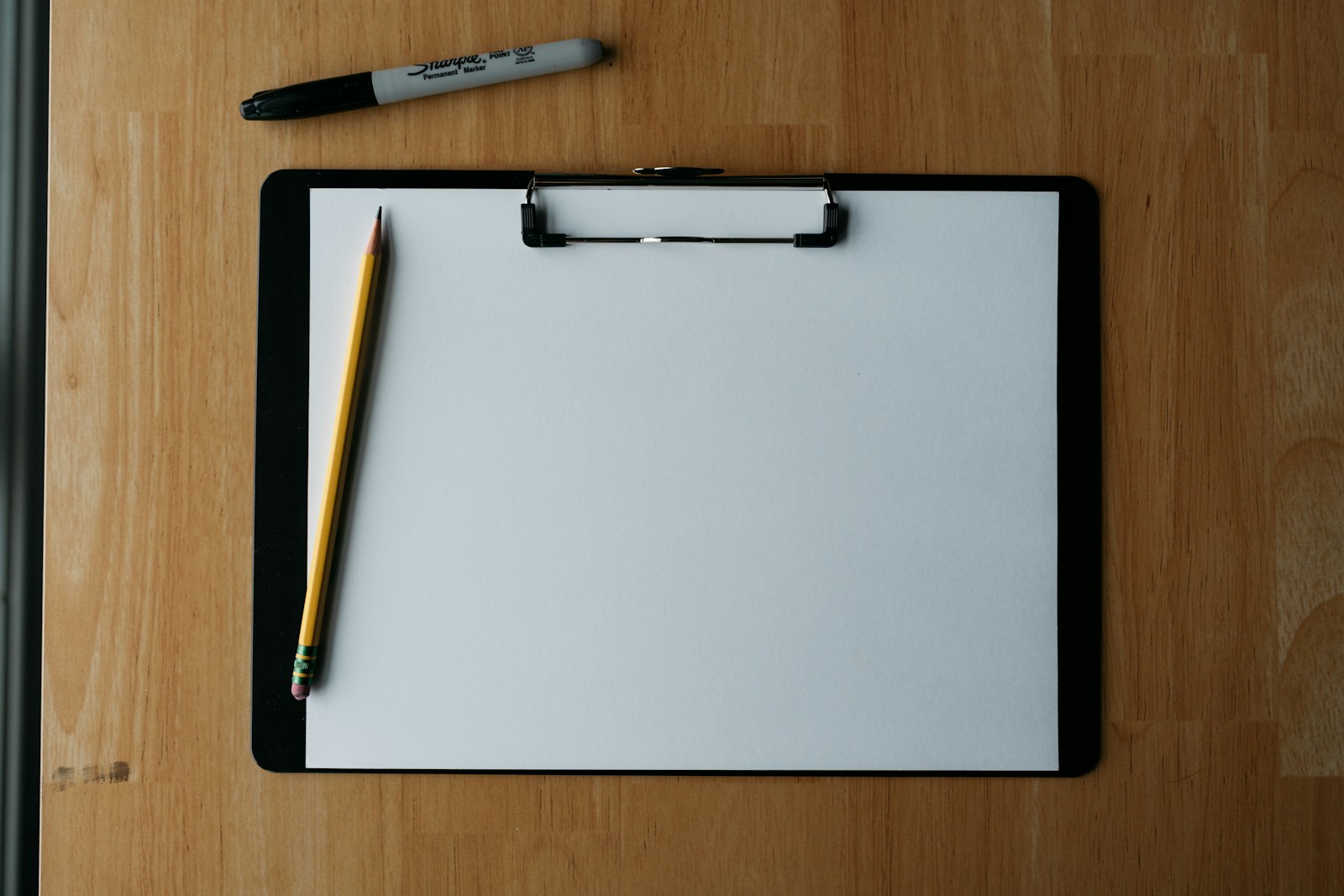 Clipboard and writing materials for membership registration